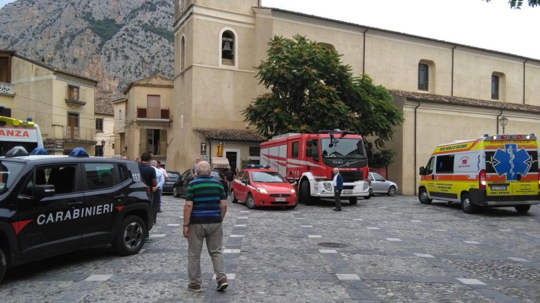 Rescue vehicles gather in Civita on Monday.