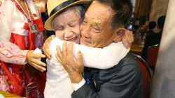 South Korean Lee Keum-seom (L), 92, meets with her North Korean son Ri Sung Chol (R), 71, during a separated family reunion meeting at the Mount Kumgang resort on the North's southeastern coast on August 20, 2018. - Dozens of elderly and frail South Koreans met their Northern relatives on August 20 for the first time since the peninsula and their families were divided by war nearly seven decades ago. (Photo by KOREA POOL / KOREA POOL / AFP) / South Korea OUT / REPUBLIC OF KOREA OUT        (Photo credit should read KOREA POOL/AFP/Getty Images)