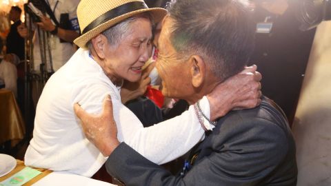 South Korean Lee Keum-seom, 92, meets with her North Korean son Sang Chol, 71, during a family reunion meeting at the Mount Kumgang resort on the North's southeastern coast on August 20, 2018.