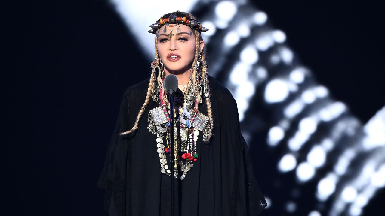 Madonna speaks onstage during the 2018 MTV Video Music Awards.