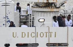 One and seventy-seven migrants rescued at sea remained aboard the Italian Coast Guard ship Diciotti Tuesday morning 