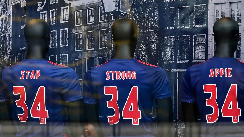 This picture shows puppets in a fanshop wearing shirts with the number 34 of Ajax midfielder Abdelhak Nouri reading "Stay strong Appie" in Amsterdam on July 22, 2017.
Ajax midfielder Abdelhak Nouri has suffered "serious and permanent" brain damage after collapsing, the Dutch club said on July 13, dashing earlier hopes the promising prospect would make a quick recovery. / AFP PHOTO / TOBIAS SCHWARZ        (Photo credit should read TOBIAS SCHWARZ/AFP/Getty Images)