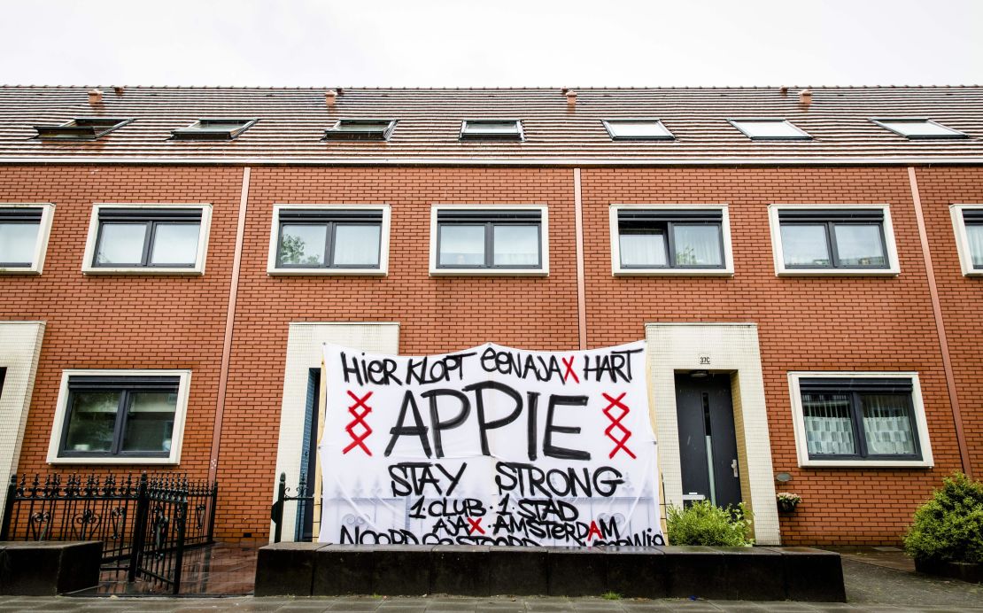 "Here beats a Ajax heart," reads a banner in the garden in front of the Nouri house in Amsterdam on July 12, 2017.