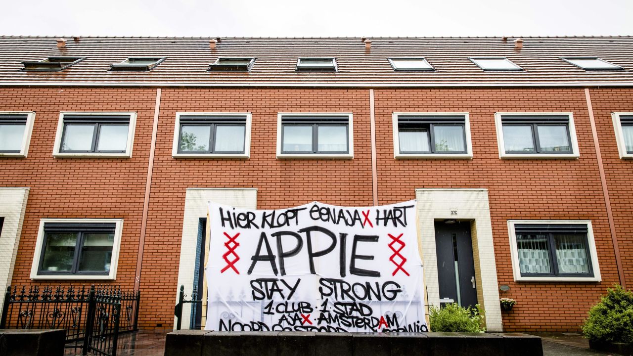 "Here beats a Ajax heart," reads a banner in the garden in front of the Nouri house in Amsterdam on July 12, 2017.