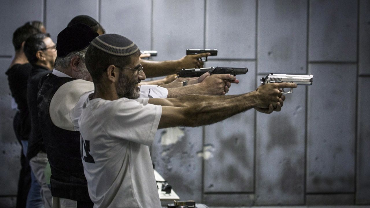 Men shoot at a gun range in Jerusalem in October 2015.