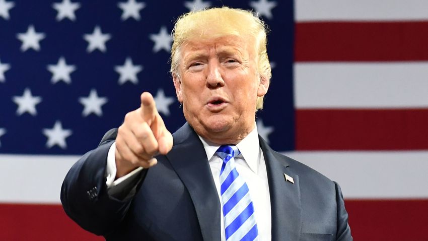 US President Donald Trump arrives for a political rally at Charleston Civic Center in Charleston, West Virginia, on August 21, 2018. (Photo by MANDEL NGAN / AFP)        (Photo credit should read MANDEL NGAN/AFP/Getty Images)