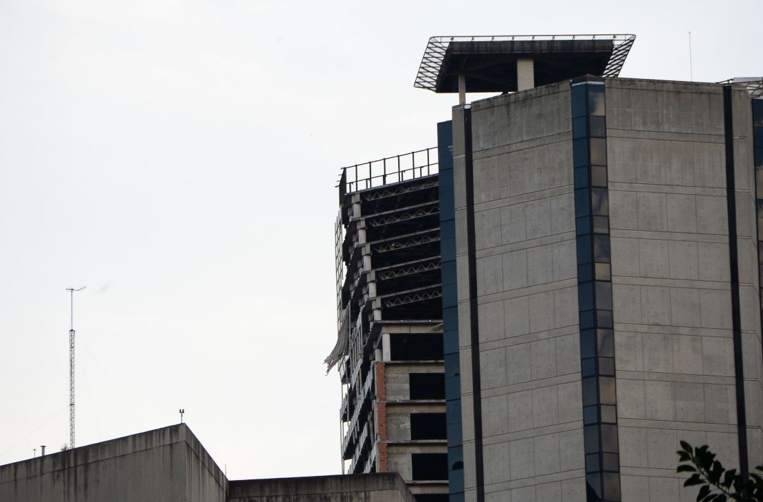 The top of an abandoned skyscraper in Caracas leans outward after the earthquake on Tuesday.