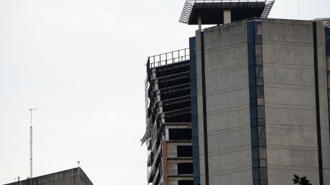 The top of an abandoned skyscraper in Caracas leans outward after the earthquake on Tuesday.
