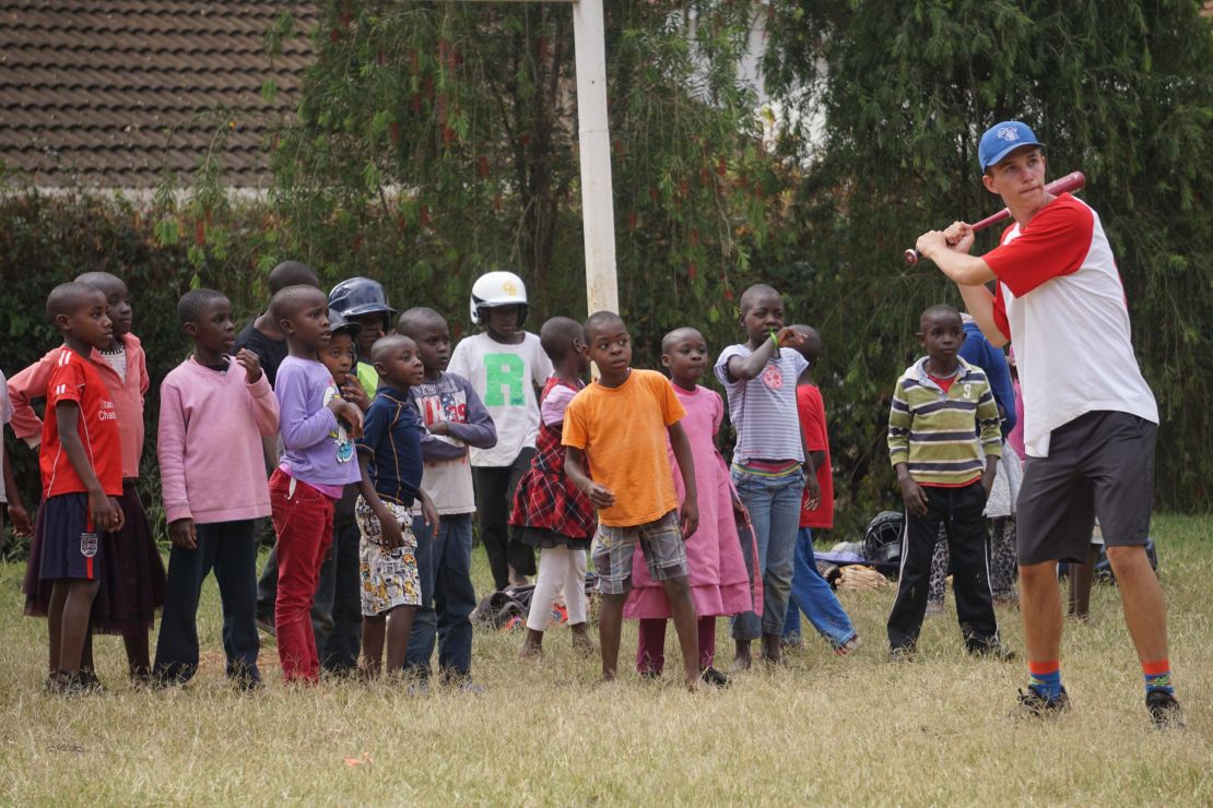 Max Bobholz shows Kenyan children the sport of baseball