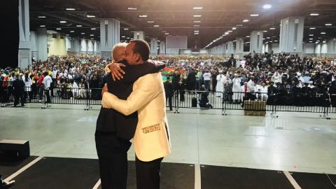 Abiy embraces Tamagn Beyene, an outspoken critic of the previous Ethiopian governments, during his American tour.