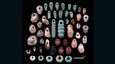 Stone pendants and earrings from the communal cemetery of Lothagam North, Kenya.