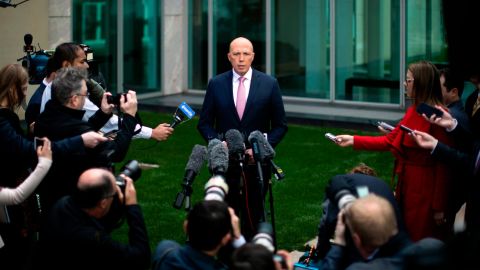 Australia's former home affairs minister, Peter Dutton, faces the media at a press conference in Canberra on August 21.