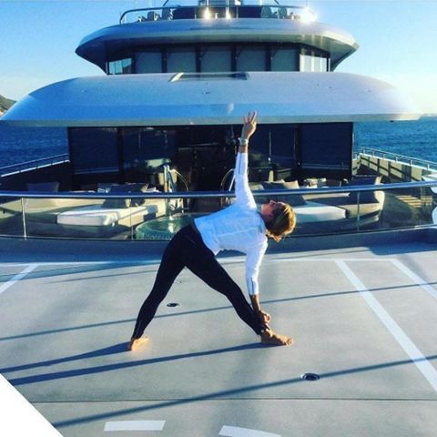 "The yachting industry is very materialistic and very luxurious and a lot of beauty is to be said about it but you can lose track of your heart and soul and the things that really matter in life and I feel honored to be able to reconnect people to that part of them," Nielsen says about teaching yoga onboard.