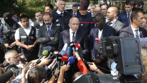 French Interior Minister Gerard Collomb addresses reporters after a knife attack Thursday in Trappes.