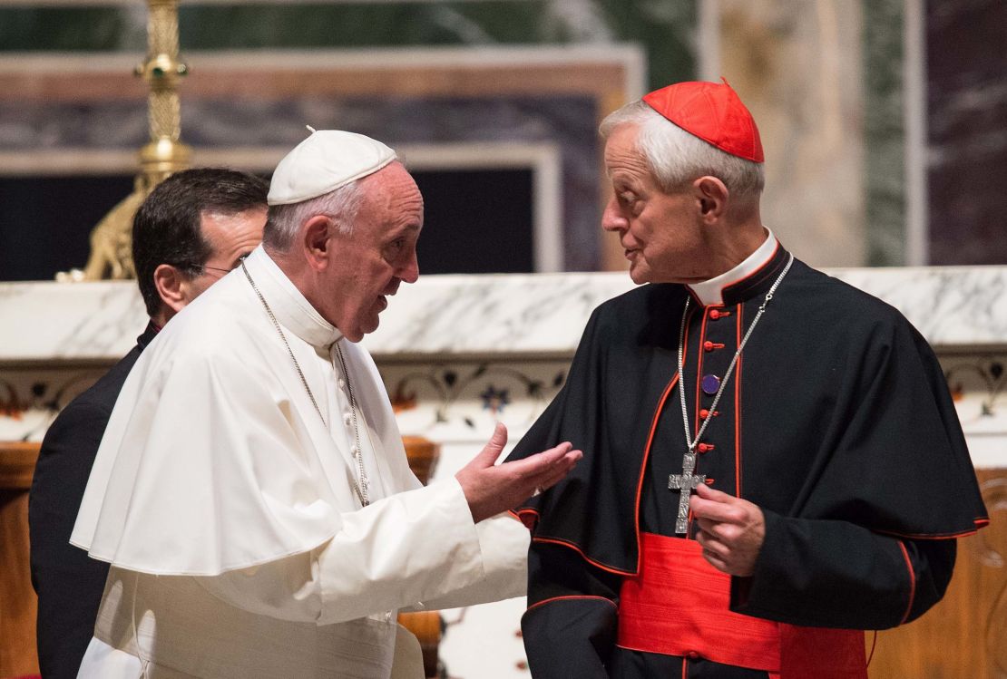 Pope Francis speaks with Cardinal Donald Wuerl during his visit to the US in September 2015. 