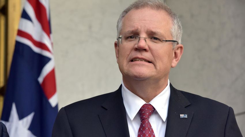Australia's Treasurer Scott Morrison attends a press conference in Parliament House in Canberra on August 22, 2018. - Australia's Prime Minister Malcolm Turnbull narrowly survived a move to unseat him by his populist Home Affairs Minister Peter Dutton on August 21 with a Liberal party ballot voting 48-35 in his favour. (Photo by MARK GRAHAM / AFP)        (Photo credit should read MARK GRAHAM/AFP/Getty Images)