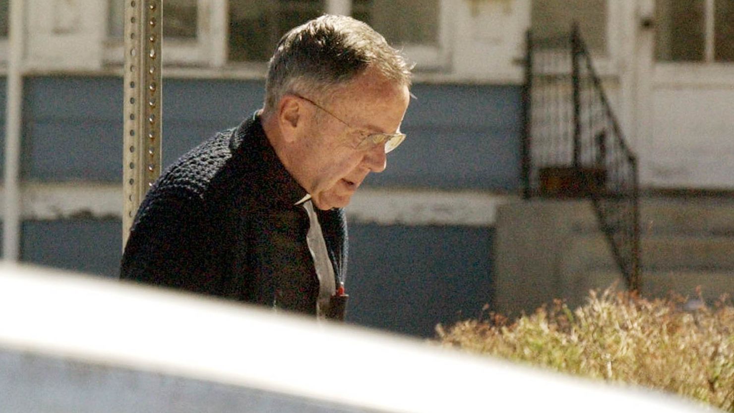 Retired Bishop Joseph Hart arrives at the offices of his attorney in Cheyenne, Wyoming, on Wednesday. 