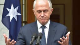 Australia's Prime Minister Malcolm Turnbull gestures during a press conference at Parliament House in Canberra on August 23, 2018. - Australian Prime Minister Malcolm Turnbull was defiant on August 23 in the face of a new leadership challenge, refusing to "give in to bullies" and vowing to quit politics if he loses a leadership challenge. (Photo by MARK GRAHAM / AFP)        (Photo credit should read MARK GRAHAM/AFP/Getty Images)