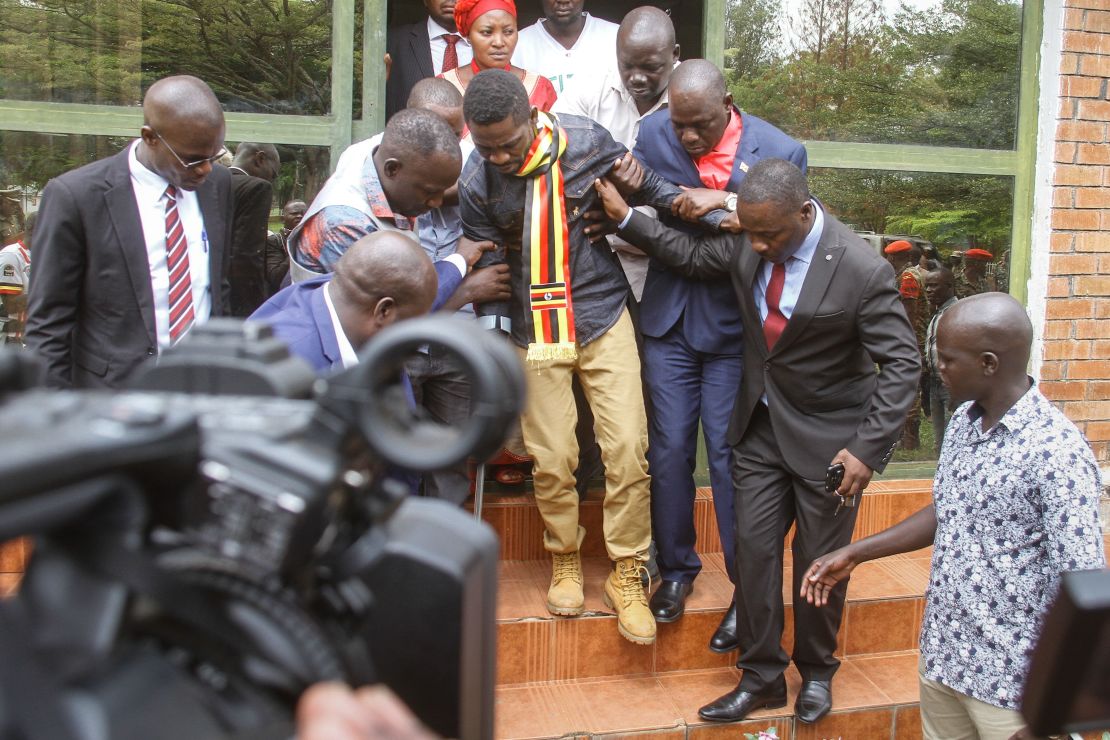 Ugandan politician Robert Kyagulanyi, known as Bobi Wine, center, in northern Uganda on August 23.
