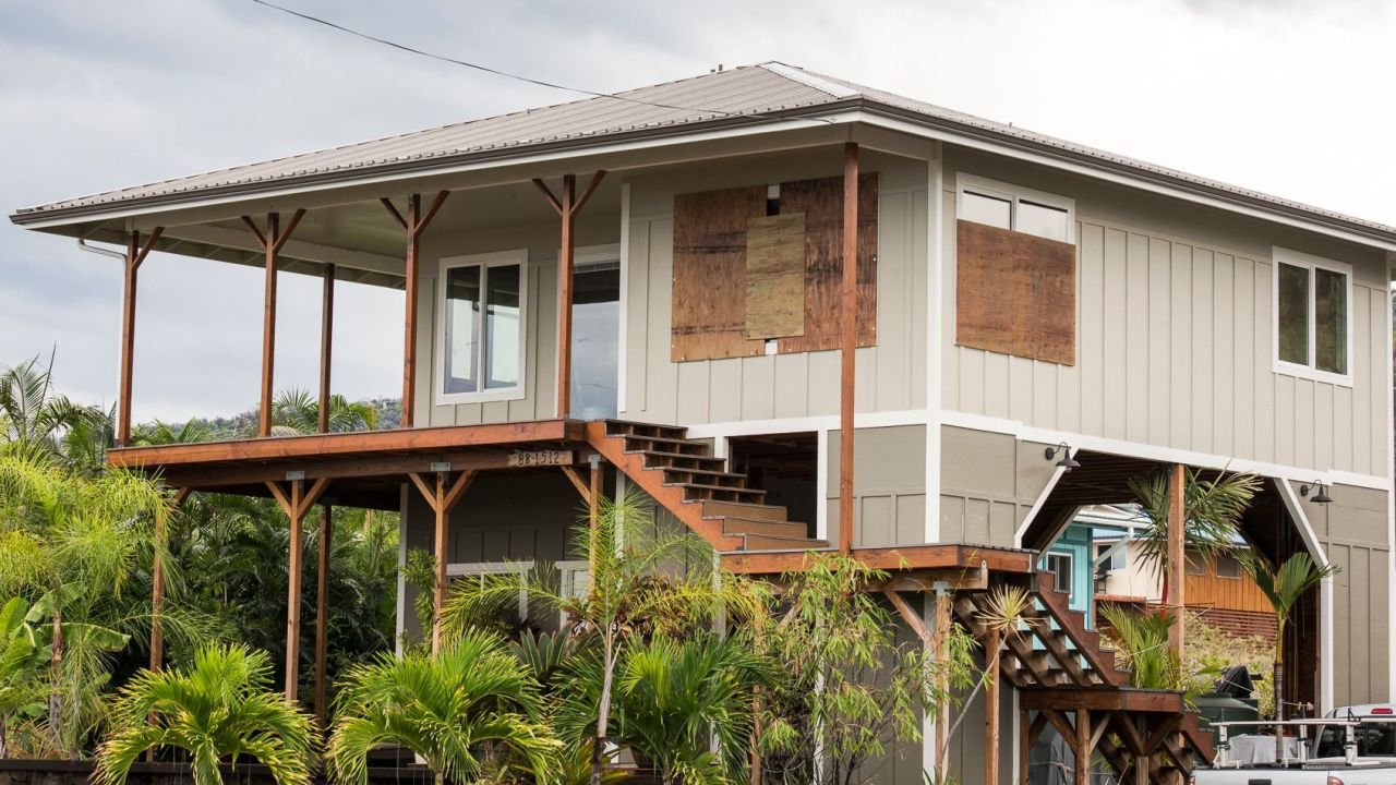 Some windows on a home in Milolii, Hawaii, are boarded up as residents await the full brunt of Hurricane Lane.