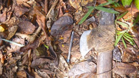 An ax discovered by researchers from Brazil's National Indian Foundation during a recent survey of uncontacted tribes in the Amazon. The pen is used for scale. 