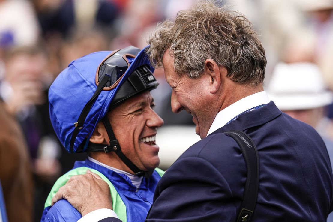 Mark Johnston with Frankie Dettori after winning the race with Poet's Society.  