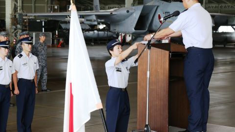 Misa Matsushima receiving her certificate from the Japan Air Self-Defense Force.