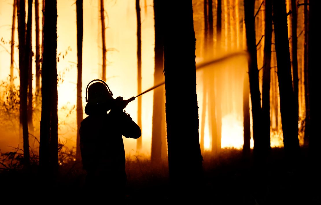 A firefighter in action during the forest fire on Thursday.
