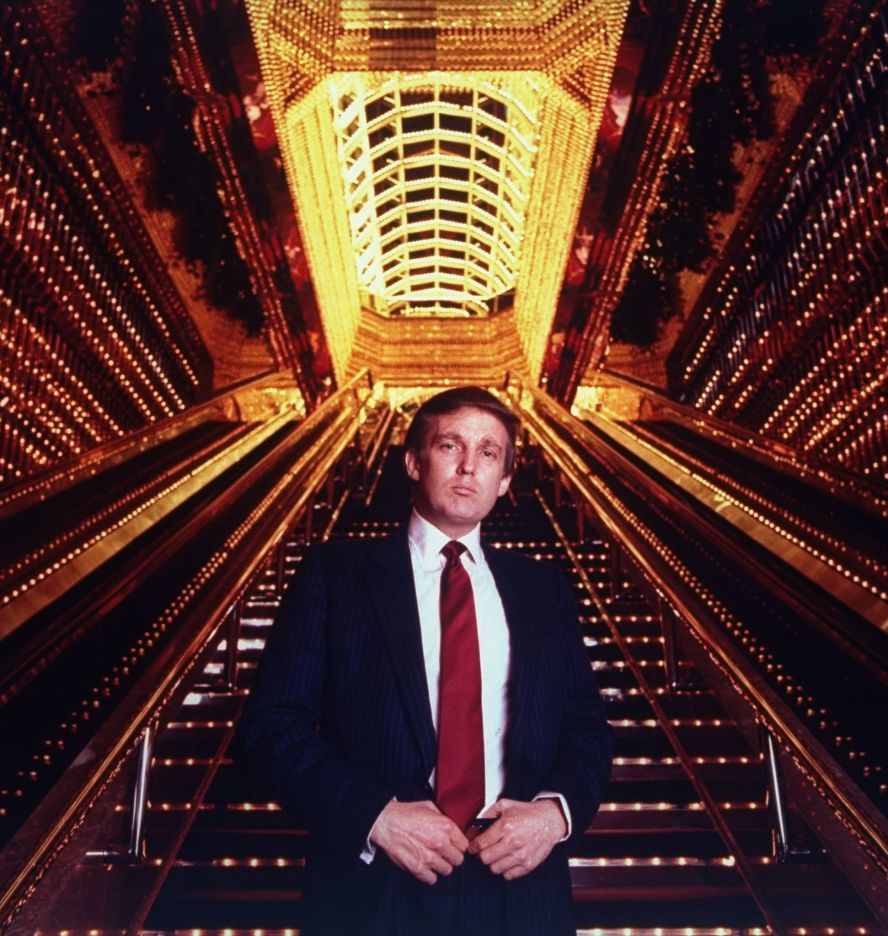 Trump stands in the atrium of Trump Tower.