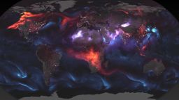 A composite image using NASA satellite imagery shows the different kinds of aerosols in the earth's atmosphere. 
