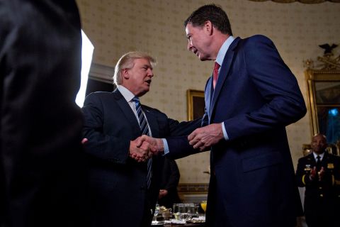 Trump shakes hands with FBI Director James Comey during a White House reception in January 2017. <a href="http://www.cnn.com/2017/05/09/politics/james-comey-fbi-trump-white-out/index.html" target="_blank">Trump fired Comey</a> a few months later, sweeping away the man who was responsible for the FBI's investigation into whether members of Trump's campaign team colluded with Russia in its election interference. The Trump administration attributed Comey's dismissal to his handling of the investigation into Hillary Clinton's email server.