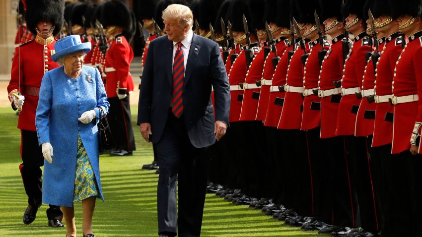 WINDSOR, ENGLAND - JULY 13:  U.S. President Donald Trump and Britain's Queen Elizabeth II inspect a Guard of Honour, formed of the Coldstream Guards at Windsor Castle on July 13, 2018 in Windsor, England.  Her Majesty welcomed the President and Mrs Trump at the dais in the Quadrangle of the Castle. A Guard of Honour, formed of the Coldstream Guards, gave a Royal Salute and the US National Anthem was played. The Queen and the President inspected the Guard of Honour before watching the military march past. The President and First Lady then joined Her Majesty for tea at the Castle.  (Photo by Matt Dunham/WPA Pool/Getty Images)