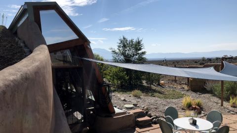 A home in Greater World Community, the first earthship subdivision.