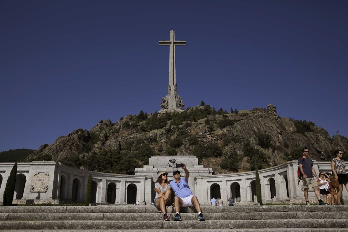 A couple take a photo at the Valley of the Fallen monument Friday.