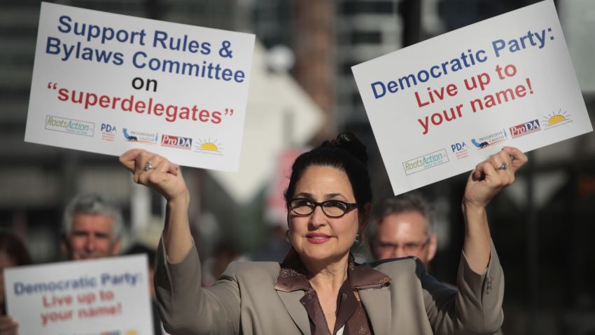 CHICAGO, IL - AUGUST 23:  Demonstrators protest outside the Hyatt Hotel where the Democratic National Committee (DNC) were kicking off their summer meeting on August 23, 2018 in Chicago, Illinois. The demonstrators were protesting the use of superdelegates by the Democratic party, which is one of the issues to be addressed at the meeting. During the meeting the DNC is also expected to address other issues of concern in their presidential nominating process as well as lay out plans for getting out the vote during the mid-term election and taking steps toward picking a city to host the 2020 convention.  (Photo by Scott Olson/Getty Images)