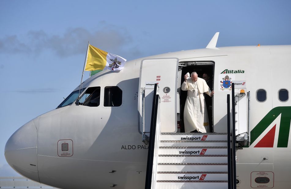 The Pope disembarks from the aircraft as he arrives in Dublin on Saturday. 