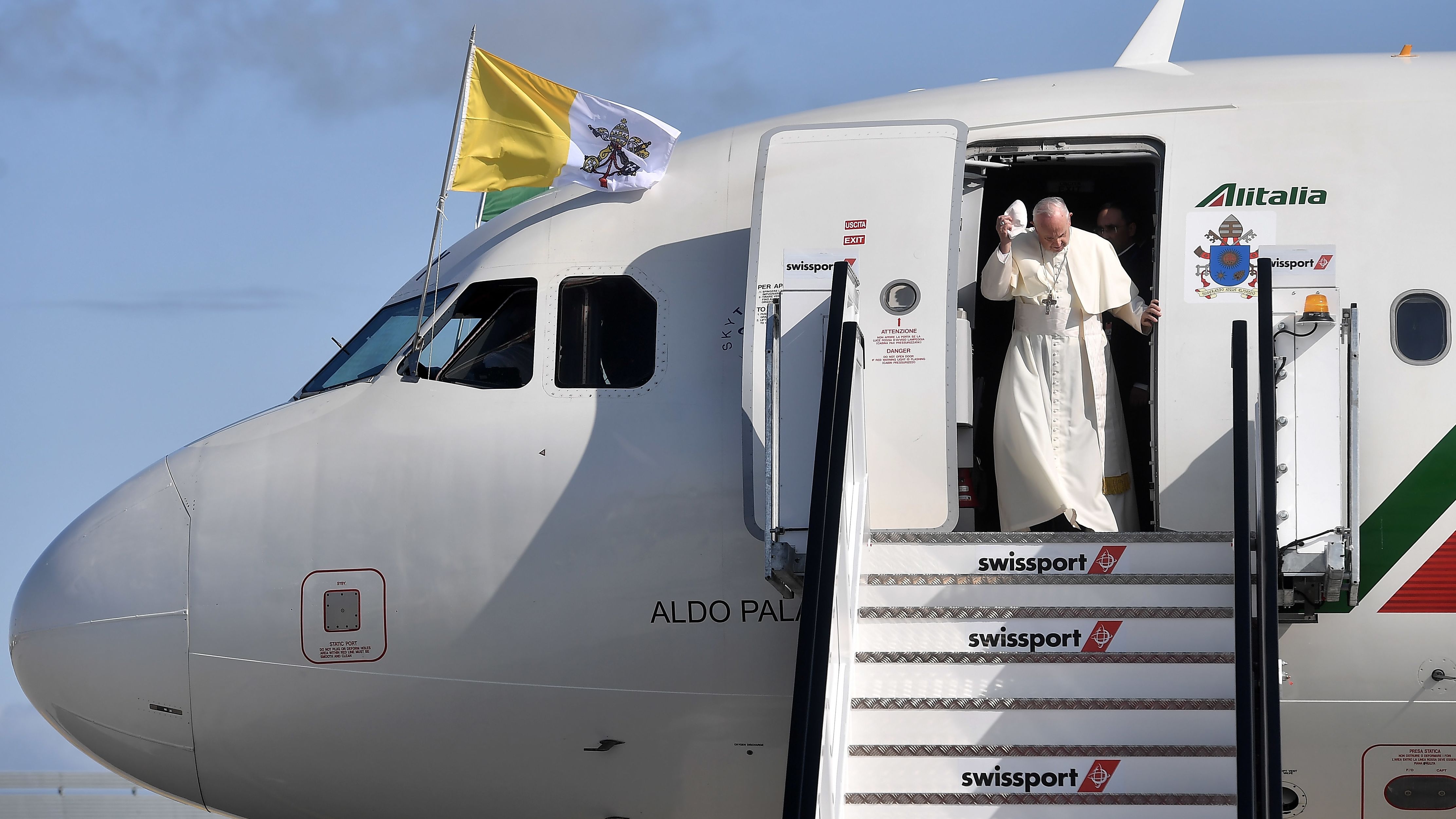 The Pope disembarks from the aircraft as he arrives in Dublin on Saturday. 