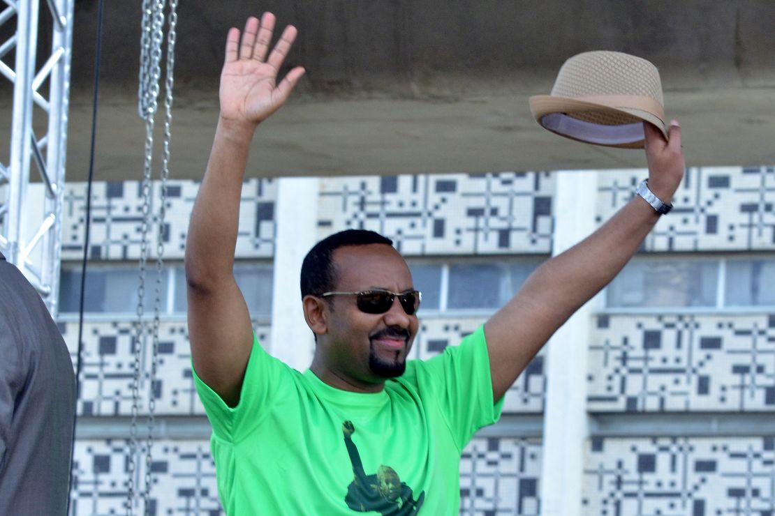 Ethiopia Prime Minister Abiy Ahmed waves to the crowd at Meskel Square in Addis Ababa on June 23, 2018.