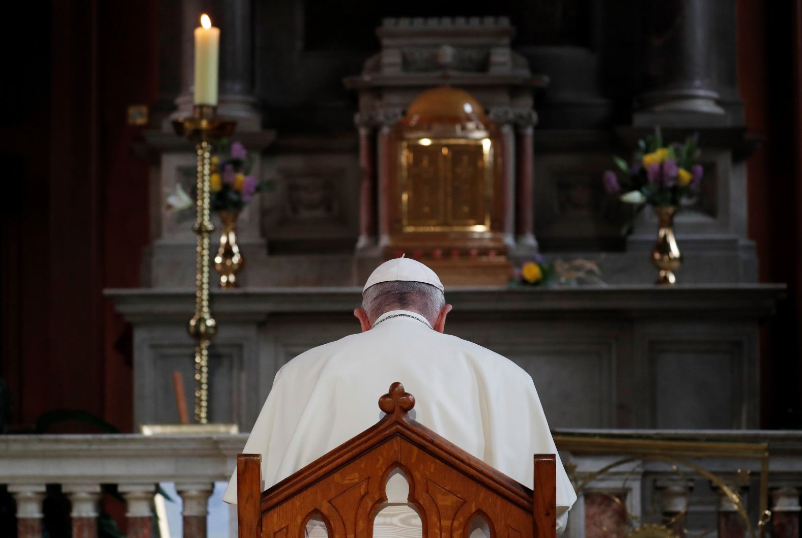 Pope Francis prays at St. Mary's Pro-Cathedral in Dublin on Saturday.