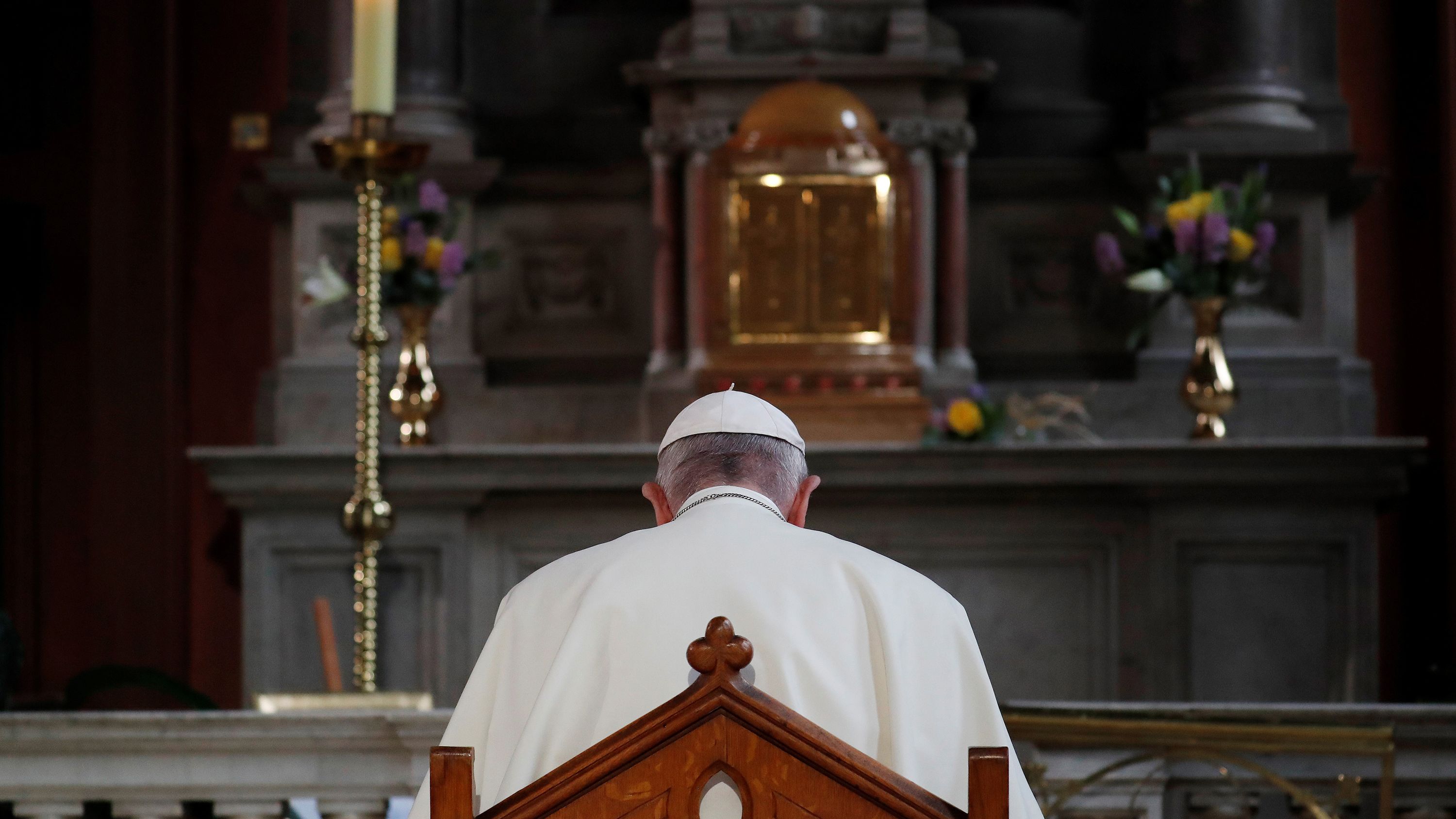 Pope Francis prays at St. Mary's Pro-Cathedral in Dublin on Saturday.