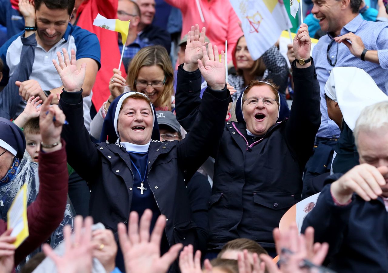 Nuns wait for Pope Francis to arrive for the Festival of Families on Saturday.
