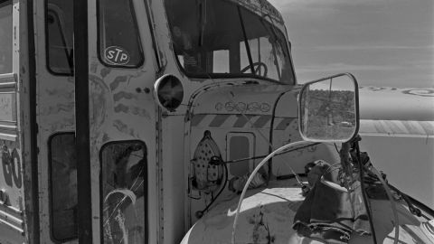 A broken bus on the property of the Hog Farm Collective commune in Llano, New Mexico, in 1969.