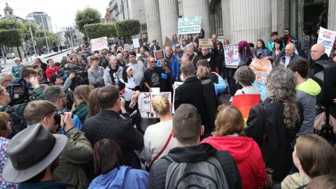 Protesters assemble at the General Post Office in Dublin, ahead of Pope Francis' Sunday Mass.