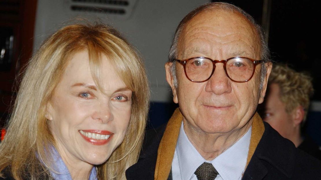 Playwrite Neil Simon arrives at the special screening of 'The Goodbye Girl' with his wife, Elaine Joyce on January 12, 2004, in New York.