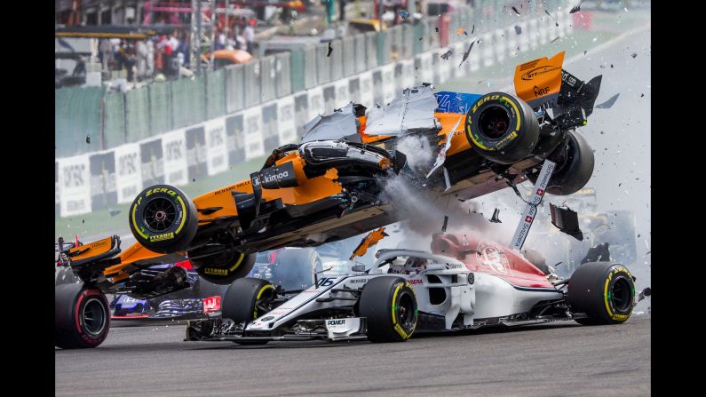 The Formula One car of Fernando Alonso goes flying after it was hit by Nico Hulkenberg during the Belgian Grand Prix on Sunday, August 26. Neither driver was hurt, nor was Charles Leclerc, who was under Alonso's car when it went airborne.
