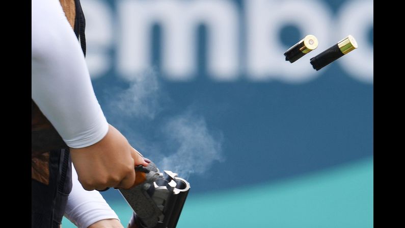 Spent shells are ejected from the gun of South Korea's Lee Bo-na, who was competing in the double trap event at the Asian Games on Thursday, August 23.