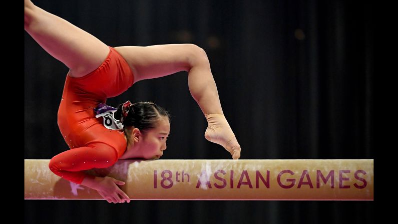 Japan's Shiho Nakaji competes on the balance beam at the Asian Games on Wednesday, August 22.