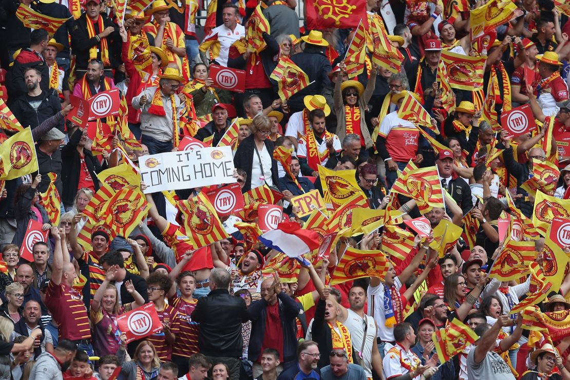 Catalans Dragons fans celebrate historic Challenge Cup victory over Warrington.