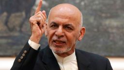 FILE - In this Sunday, July 15, 2018 file photo, Afghan President Ashraf Ghani speaks during a press conference at the presidential palace in Kabul, Afghanistan. Talks next month in Moscow to discuss a peaceful end to 17-years of war in Afghanistan that includes a place at the table for the Taliban has ruffled feathers in Washington and Kabul, who are refusing to attend, and resurrected Cold War memories. (AP Photo/Rahmat Gul)