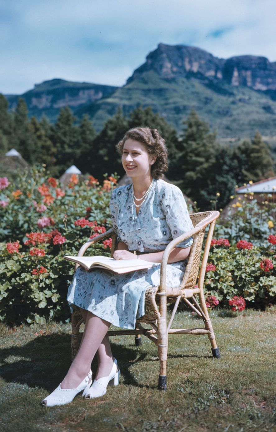 With the Drakensberg Mountains behind her, Princess Elizabeth sits in South Africa's Natal National Park on April 21, 1947. It was her 21st birthday.